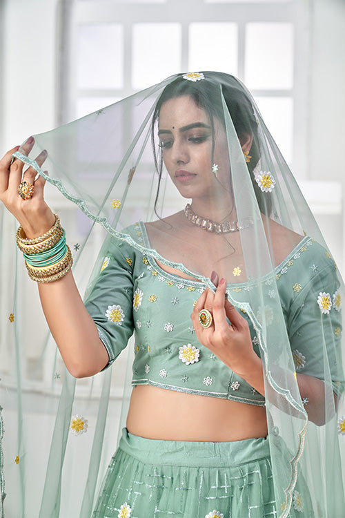 Turquoise Green Net Thread with Sequins Embroidered Lehenga Choli